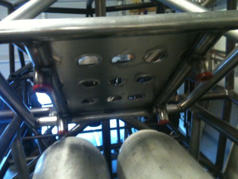 1966 Ford Bronco - Custom roll cage and fuel tanks, likely for off-road or racing use.