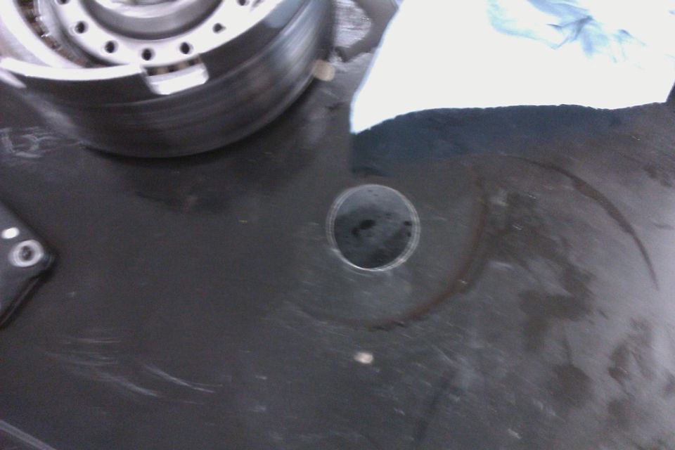 Transmission part with a circular opening and a metal component above