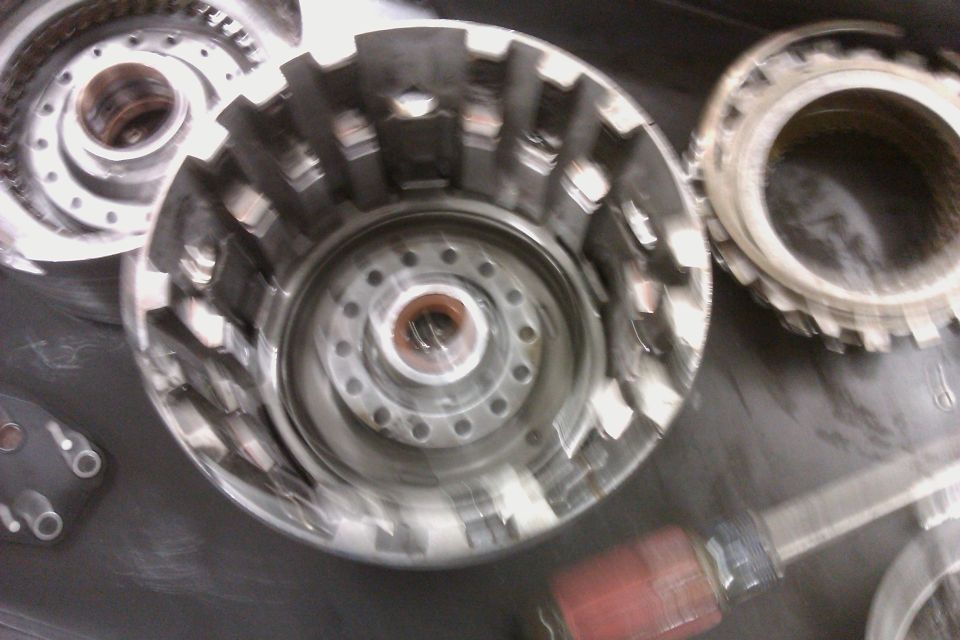 Transmission torque converter components, including clutch plates and housing