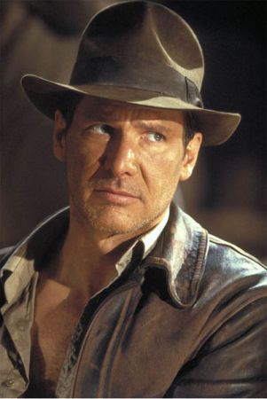 1996 Ford Bronco - A man wearing a fedora and leather jacket is shown, with a website address visible at the bottom of the image.