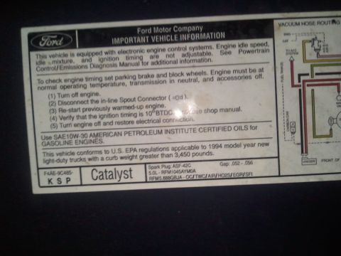 1994 Ford Bronco - Ford emissions information label including a color-coded vacuum hose routing diagram for a 1994 5.0L truck.