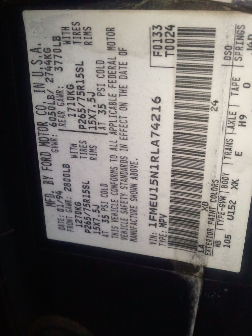 Ford door data plate listing VIN 1FMEU15N1RLA74216, GVWR, tire/rim sizes, paint and axle codes