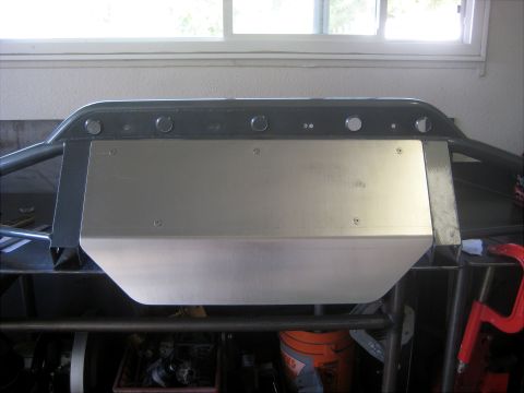 1996 Ford Bronco - A custom front bumper assembly with a brushed metal skid plate is shown, mounted on a frame.