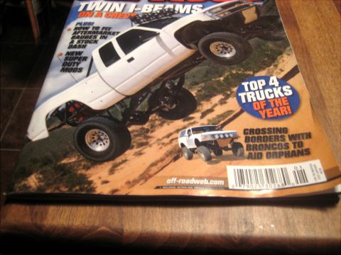 1996 Ford Bronco - Magazine cover features a lifted pickup truck and a modified Bronco, with headlines about trucks and aid efforts.