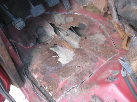 1981 Ford Bronco - Severe rust has compromised the floor pan of this 1981 Ford Bronco, affecting the pedal area.