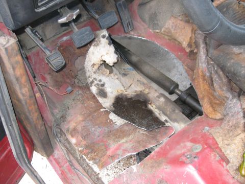 1981 Ford Bronco - The floor of this vehicle is heavily rusted and appears to be in need of repair.
