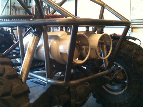 1966 Ford Bronco - Custom off-road buggy construction shows fuel tank setup and suspension details.