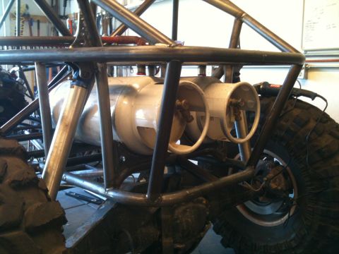 1966 Ford Bronco - Custom buggy features a roll cage and dual propane tanks mounted behind the driver's area.