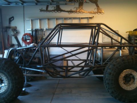 1966 Ford Bronco - This custom-built buggy frame lacks any identifiable year or make, making the 1966 Ford Bronco claim unsubstantiated.
