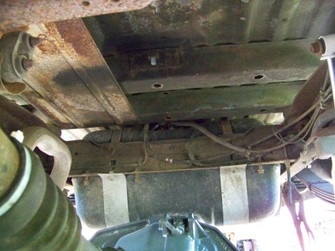 1989 Ford Bronco - Undercarriage view showing fuel tank and suspension parts.