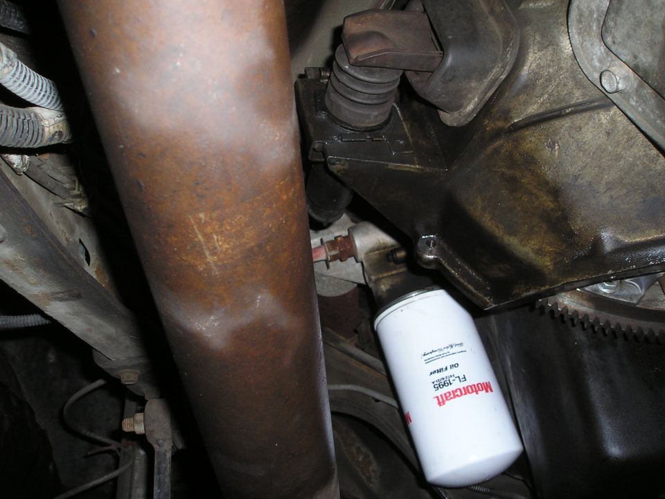 Driveshaft and Motorcraft FL-1995 oil filter on a vehicle underside