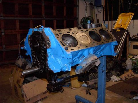 1980 Ford Bronco - Engine block assembly on a stand, likely undergoing reassembly or repair.