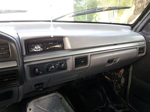 1995 Ford Bronco - Interior view of a 1995 Ford Bronco, showing the dashboard, Pioneer radio, and climate controls.
