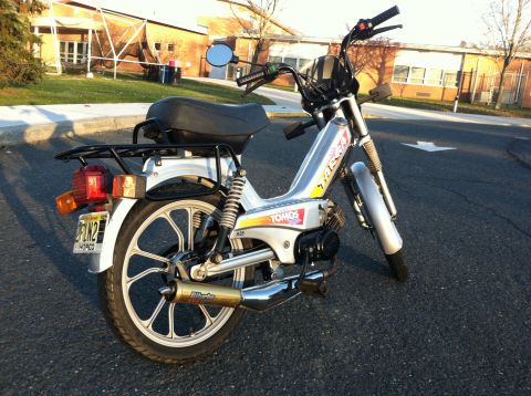 1999 Tomos Targa - A Tomos moped is parked on asphalt with a building in the background.