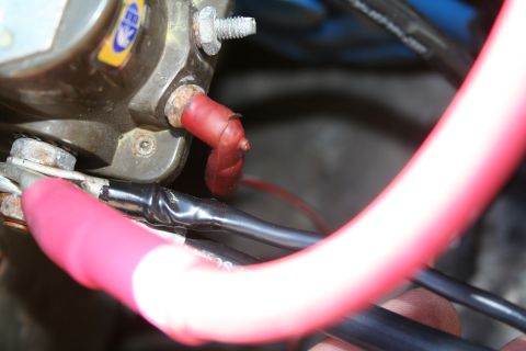 1982 Ford Bronco - Close-up view of starter motor wiring, showing connections and cables.