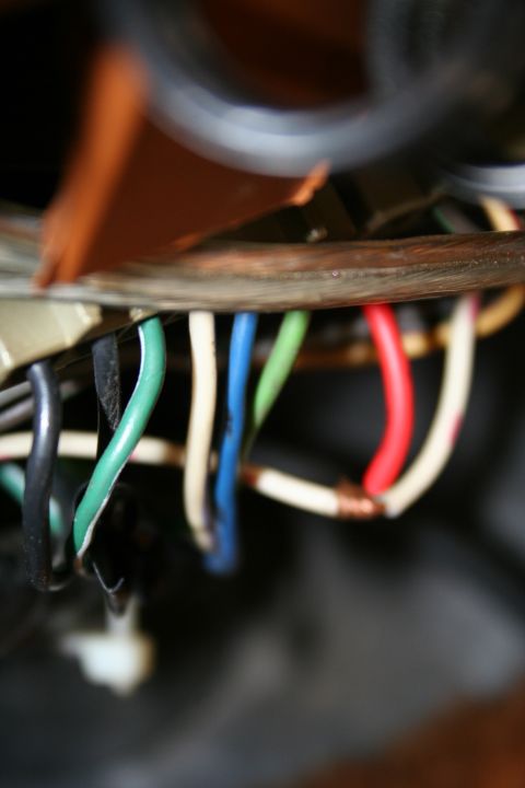 1982 Ford Bronco - Close-up view of a vehicle's wiring harness, showing various colored wires connected.