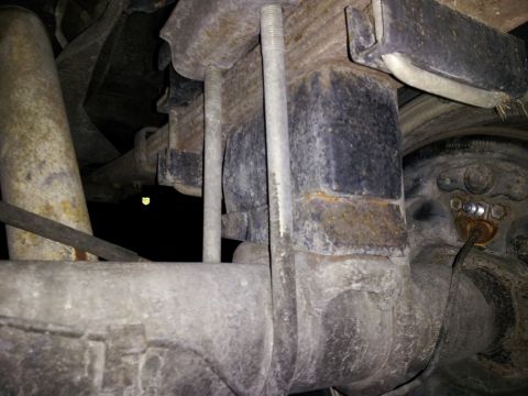1995 Ford Bronco - Rear suspension leaf spring and axle assembly detail.