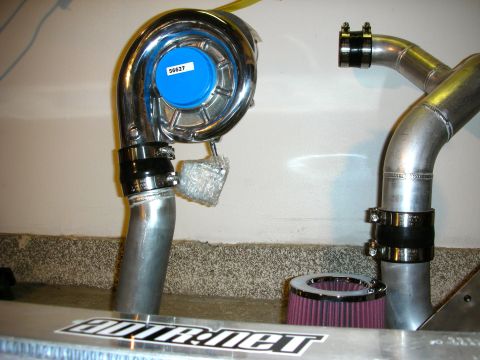 2004 Ford Crown Victoria - Custom turbocharger and exhaust piping kit, possibly for performance modification.