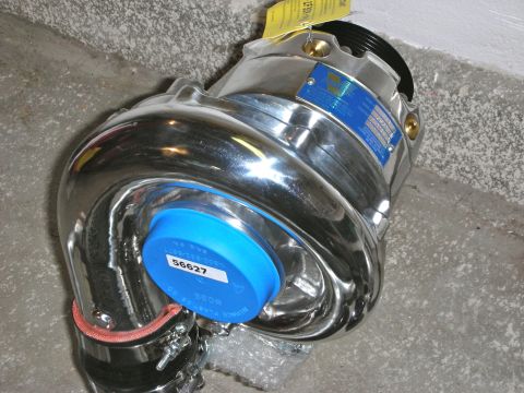 2004 Ford Crown Victoria - A polished supercharger unit is shown, a blue cap with the number 56627.