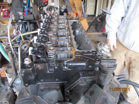 1984 Ford Bronco - Close-up of an engine block, showing internal components and a date stamp of 11/05/2011.