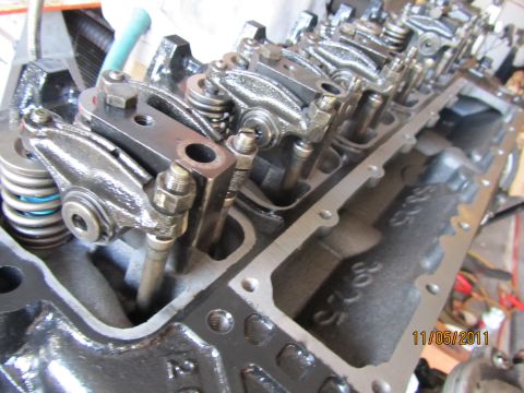 1984 Ford Bronco - Engine cylinder head detail showing internal components and casting marks.