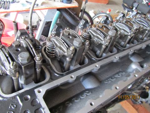 1984 Ford Bronco - Close-up view of an engine's valve train components, including rocker arms and springs.