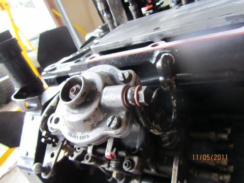 1984 Ford Bronco - Detail of an engine fuel injection pump, showing part numbers and mechanical components.