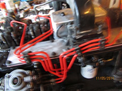 1984 Ford Bronco - Engine components and red fuel lines visible in the photo. Date stamp 11/05/2011.