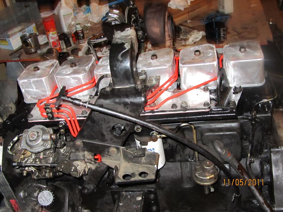 Engine with aluminum valve covers and red fuel lines
