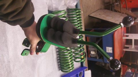 1979 Ford Bronco - Green suspension components and coil springs are displayed, with a "Supermotors" logo visible.