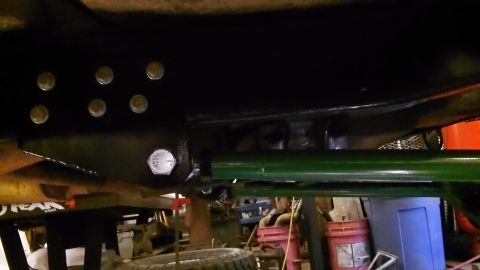 1979 Ford Bronco - Close-up view of the undercarriage, highlighting suspension and frame components.