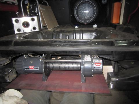 2008 Jeep Wrangler - Vehicle's front bumper area modified to mount a Warn XP winch and additional accessories.