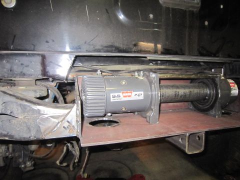 2008 Jeep Wrangler - Warn 9.5 XP winch installed on a custom bracket, likely for off-road use.