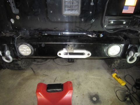 2008 Jeep Wrangler - Rear view of a Jeep Wrangler showing an installed winch and tow hooks.