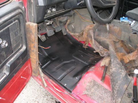 1981 Ford Bronco - New floor pan installed in a 1981 Ford Bronco, covering rusted areas.