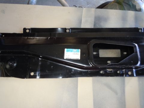 1973 Pontiac Trans Am - A black metal automotive part is shown with a GM parts label attached.