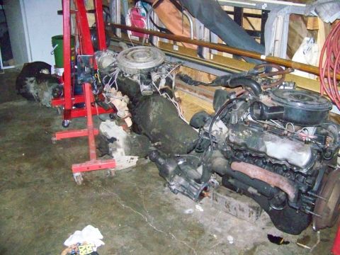 1985 Ford Bronco - Engine and transmission assembly removed from a vehicle, possibly for a swap.