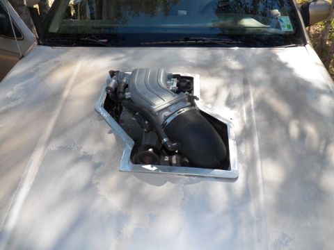 1993 Ford Crown Victoria - Custom hood modification with engine intake manifold visible.