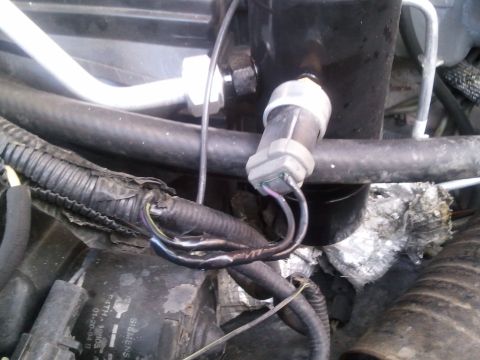 1994 Ford Bronco - Close-up of an AC system component, possibly a pressure switch, with visible wiring and a Siemens part number.
