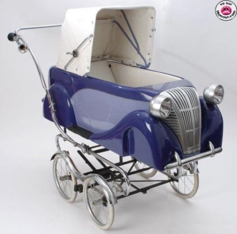 1991 Ford LTD Crown Victoria - This baby carriage is designed to resemble a classic automobile with its distinctive grille and rounded body.