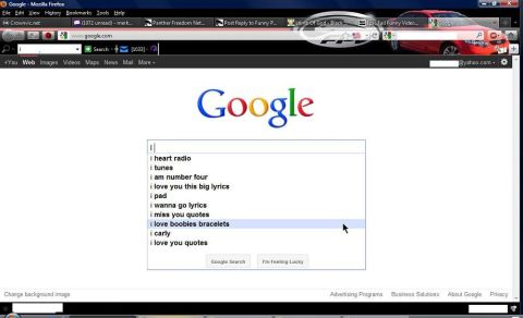 2000 Mercury Grand Marquis - A Google search page displays various search suggestions, including 'i love boobies bracelets'.