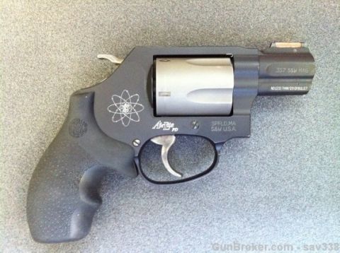 2000 Chevrolet Tahoe - This is a Smith & Wesson .357 Magnum revolver, marked 'AirLite PD'.