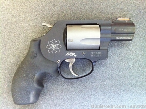 Smith & Wesson .357 Magnum revolver with an atomic symbol engraving