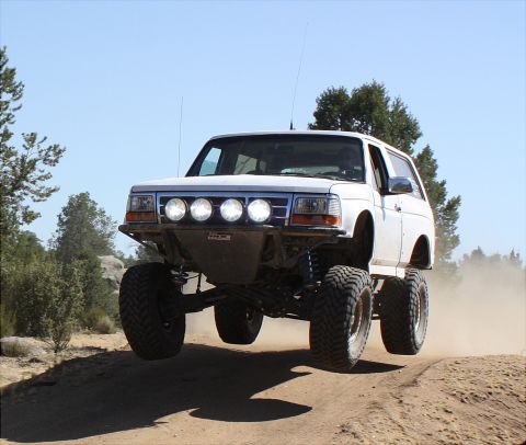 1996 Ford Bronco - This 1996 Ford Bronco is captured mid-air during an off-road excursion.