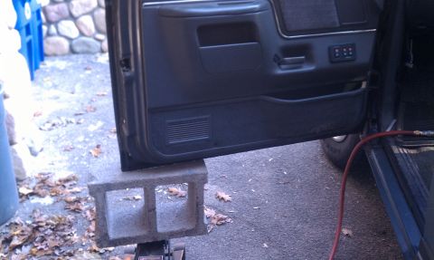 1990 Ford Bronco - First I needed to prop the door - a cinder block and jack worked well enough.