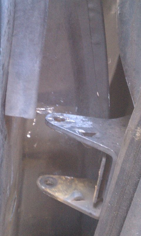 1990 Ford Bronco - I mannged to not mangle the hing too much.
