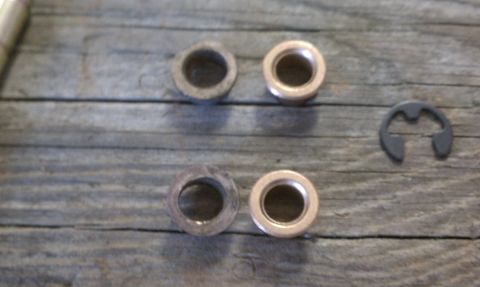 1990 Ford Bronco - Old bushings on the left, new bushings on the right