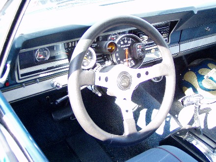 1999 Ford Crown Victoria - Custom interior features aftermarket gauges and a three-spoke steering wheel.