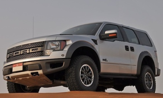 Silver SUV with FORD grille, 3q-front view