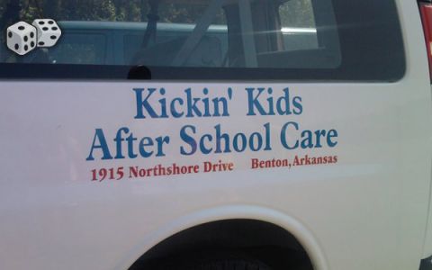 2000 Mercury Grand Marquis - A white van displays 'Kickin' Kids After School Care' along with an address and city in Arkansas.